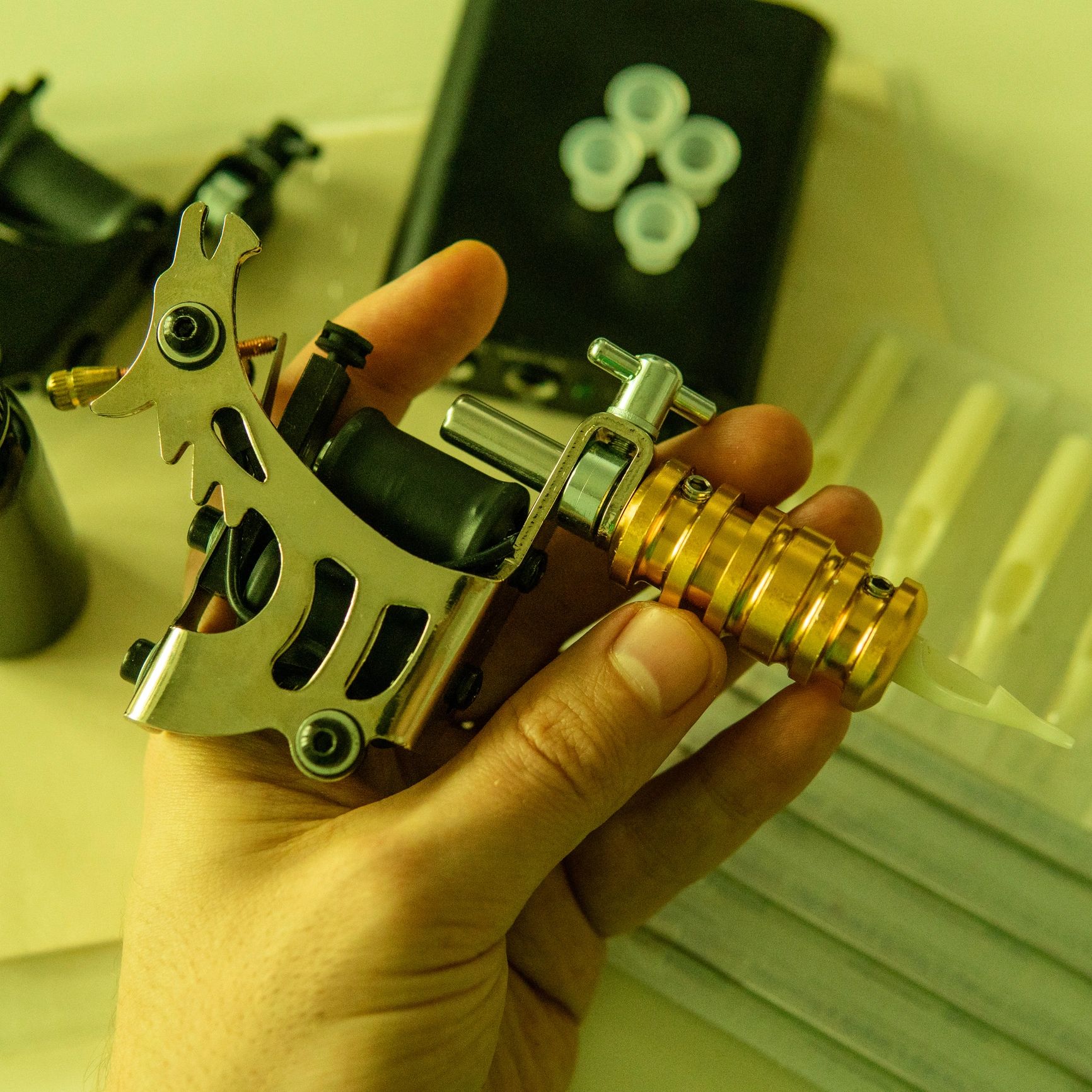 Tattoo machine and tools in close-up